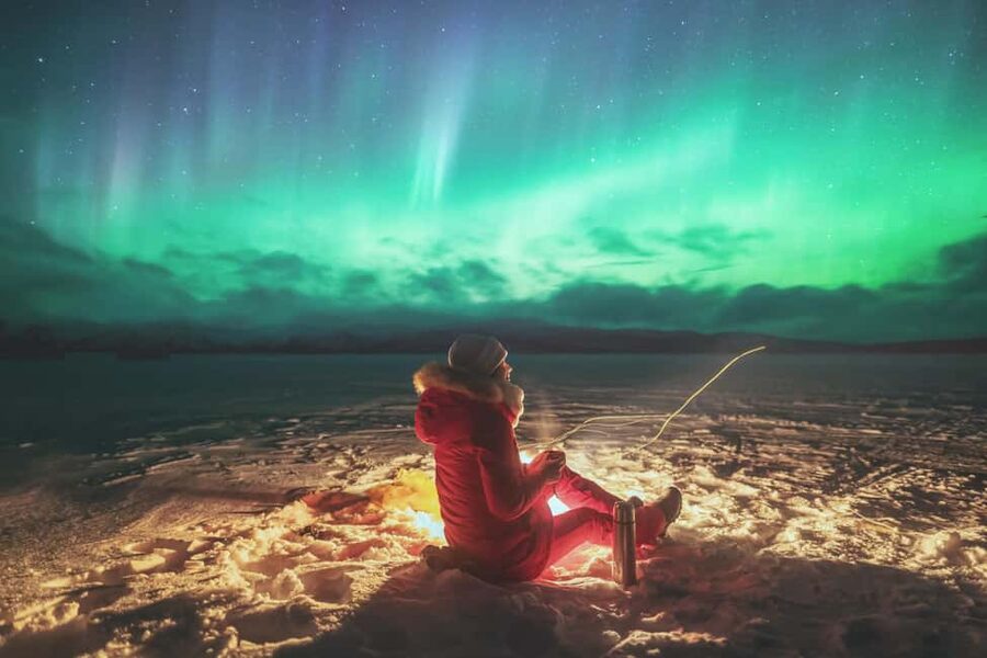 Abisko: Northern Lights Photography Tour with Dinner - Chasing clear skies by 4x4