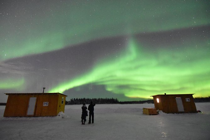 Aurora Borealis Viewing and Ice Fishing Adventure - Reindeer sausage, cocoa, and fresh-cooked fish
