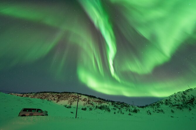 Aurora Hunt with the campfire and professional photographer - Bonfire food and warm drinks