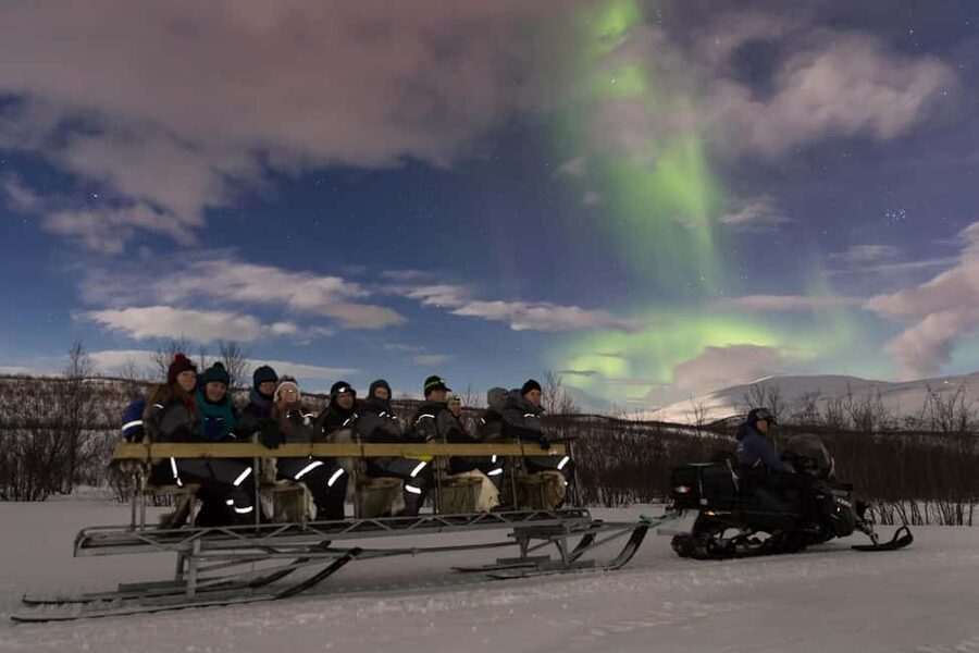 Aurora Snowmobile Sled Tour - A campfire with hot lingonberry tea