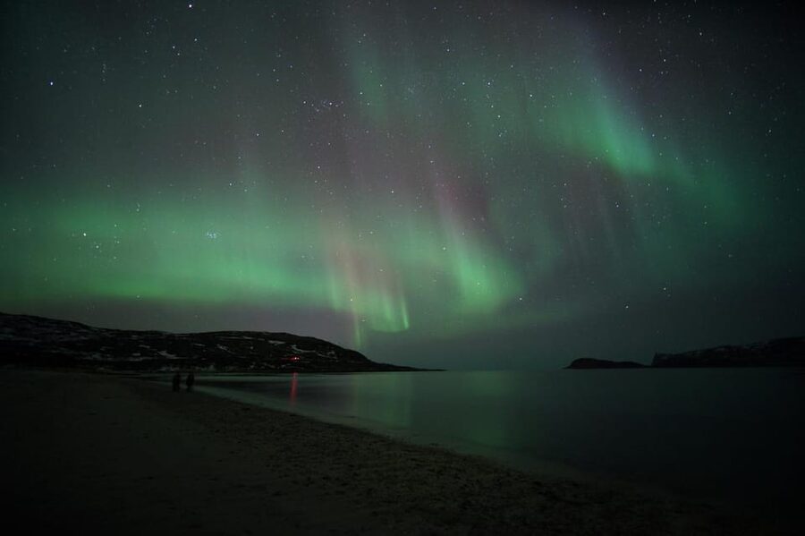 From Tromsø: Aurora Bus Tour with Snacks, Photos, and Drinks - Warm drinks, snacks, and thermal suits