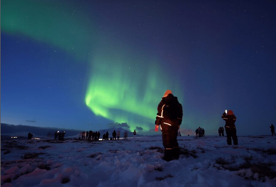 From Tromsø: Northern Lights Tour in Minibus with Photos - Leaving Tromsø in a 15-seat Mercedes Vito