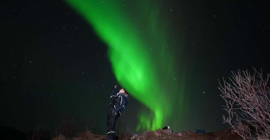 From Tromsø: Northern Lights Tour with Hot Drinks and Photos - Chasing clear skies instead of waiting in one place
