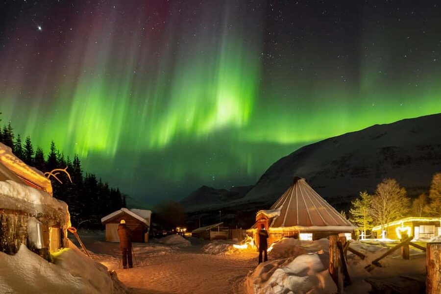 From Tromsø: Northern Lights Visit at Camp Tamok - Firelight, stew, and a traditional Sámi lávvu