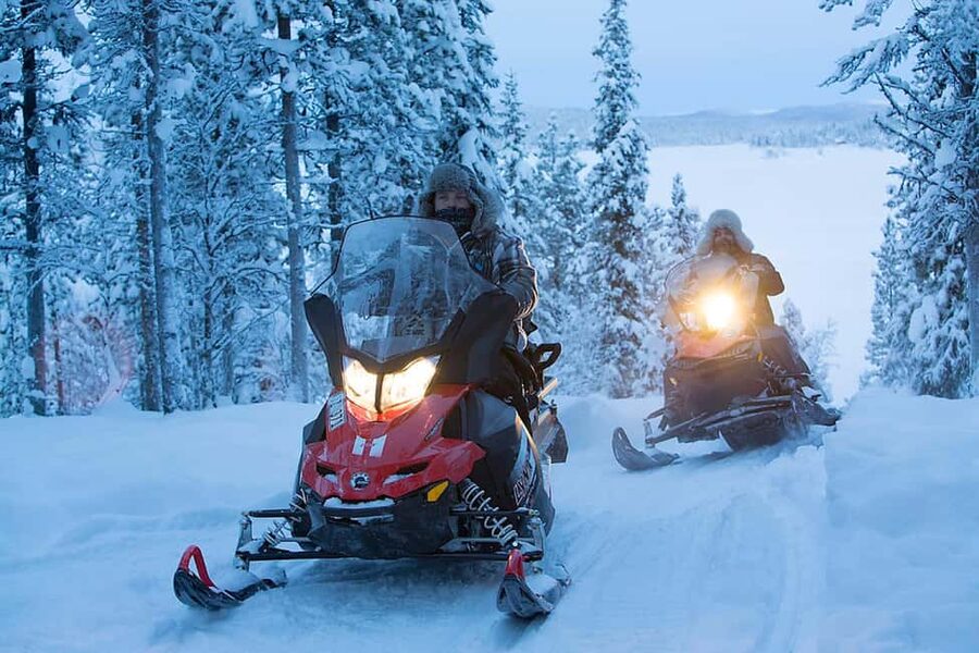 Kiruna: Northern Lights Snowmobile Tour with Transfer - Getting ready with winter gear and a helmet
