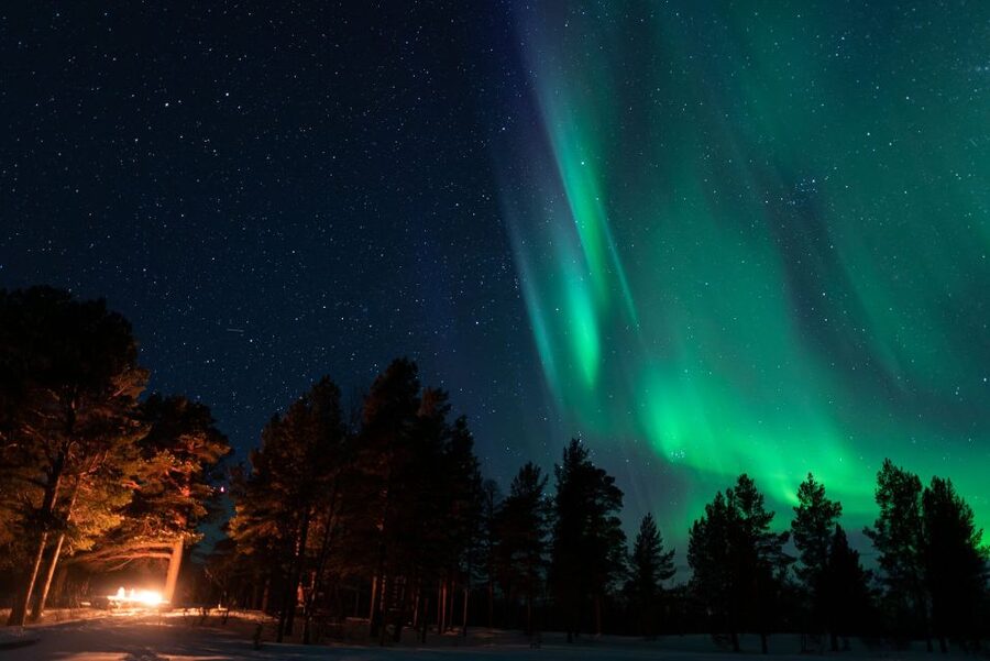 Kiruna: Northern Lights Tour with Photos - Campfires, cabins, and the hard work of staying warm