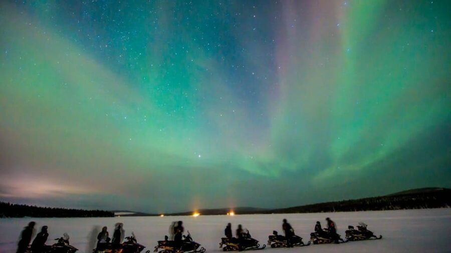 Levi: Northern Lights Snowmobile Safari and Campfire Picnic - Family Arrangements and Scenic Sled Rides