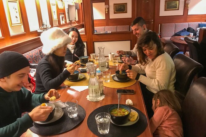 Luxury Northern Lights Yacht Cruise with Hot Tub from Tromsø - Reindeer soup in a warm wooden saloon