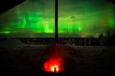 Night Snowshoeing Adventure under the Northern Lights