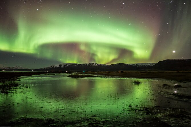 Northern Lights Classic MiniBus Tour from Akureyri - Passing Akureyri’s landmark before the hunt