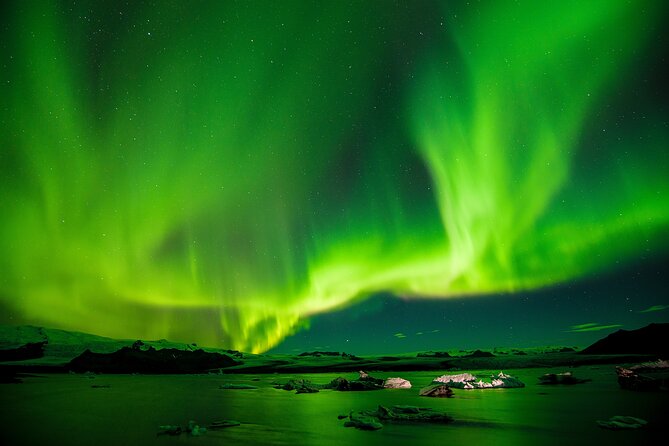 Northern Lights Small-Group Tour with Free Photos & Hot Chocolate - Chasing the aurora beyond Reykjavik’s city lights
