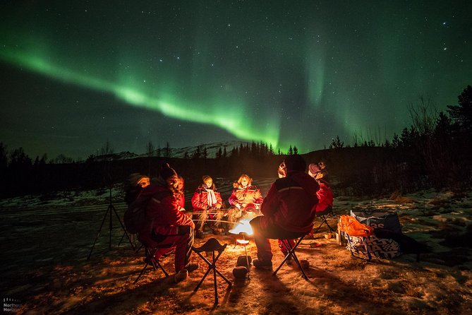 Northern Lights tour - All inclusive - Northern Horizon - Firelight, reindeer sausage, and the practical side of cold