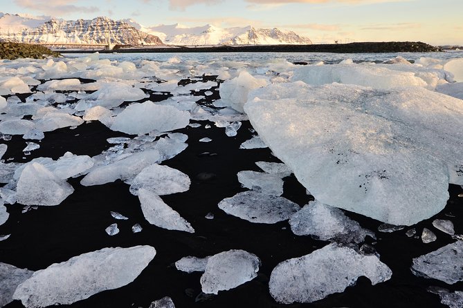 Reykjavik: Glacier Lagoon & Fjaðrárgjúfur Canyon Small-Group Tour - Diamond Beach puts the ice on black sand