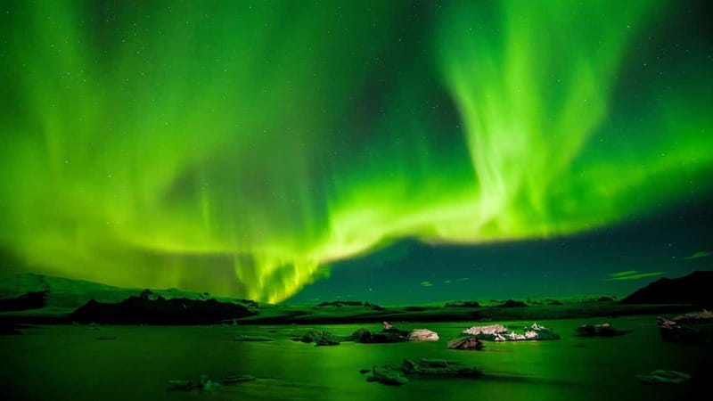 Reykjavik: Northern Lights Adventure Tour with Hot Chocolate - Leaving Reykjavik behind at night