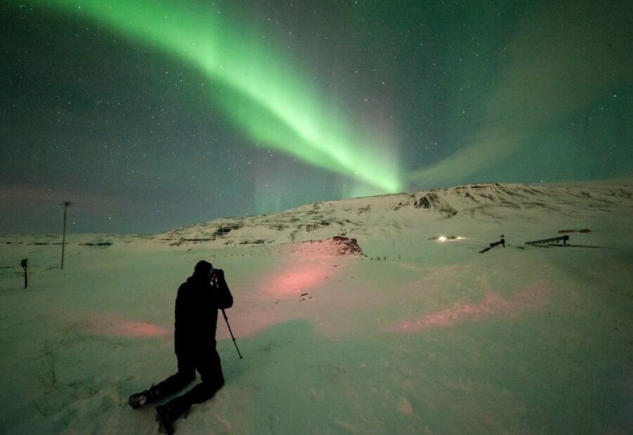 Reykjavik: Northern Lights Tour with Free Photos & Hot Cocoa - What happens at the viewing stops