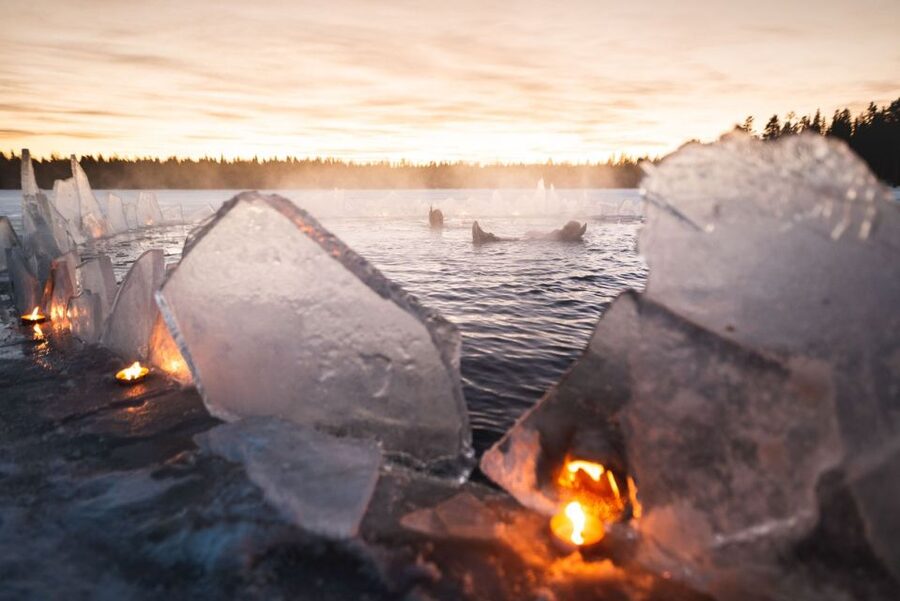 Rovaniemi: Arctic Ice Floating and Northern Lights Tour - Getting into the thermal rescue suit