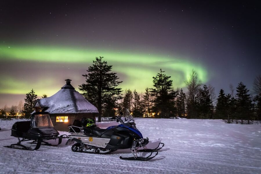 Rovaniemi: Aurora Borealis Snowmobile Safari with Campfire - Warming up beside the fire