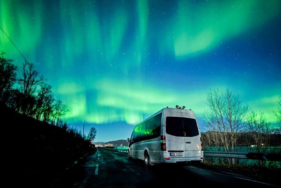 Tromsø: Northern Lights Chase with Photos and Bodysuits - Leaving Tromsø for darker skies