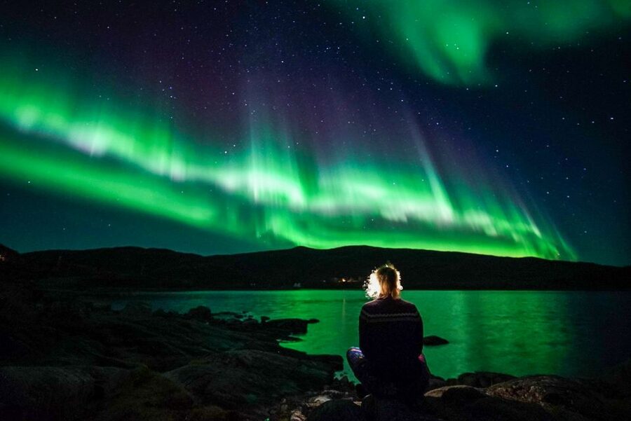 Tromsø: Northern Lights Chase with Photos and Bodysuits - Waiting outside in proper Arctic cold