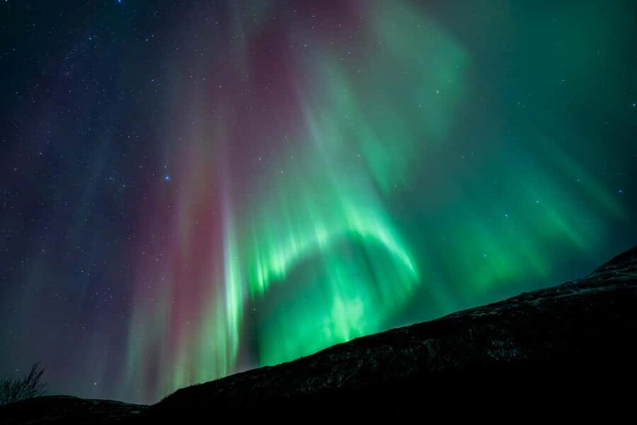 Tromsø: Northern Lights in a Minivan with Free Photos and a Hot Meal - A campfire meal that earns its place