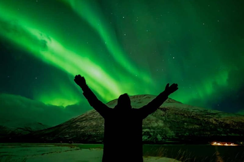 Tromsø: Northern Lights in a Minivan with Free Photos and a Hot Meal - Thermal suits, headlamps, and the cold