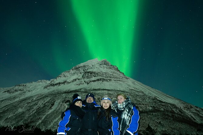 Tromso Northern Lights Minibus Chase Small Group Tour with Photos - Waiting by the fire for the sky to change