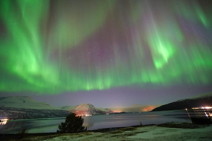 Tromso: Northern Lights Minibus Tour with Campfire - The chase: from Tromsø toward clearer skies