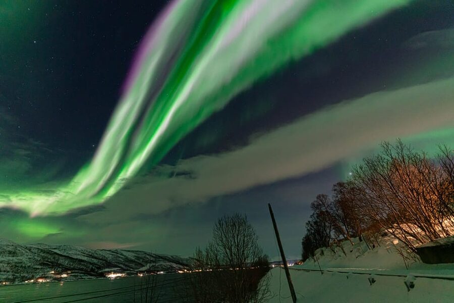 Tromsø: Northern Lights Tour w/Photo, Suits and Local Guide - Lakes, firelight, and the Arctic night