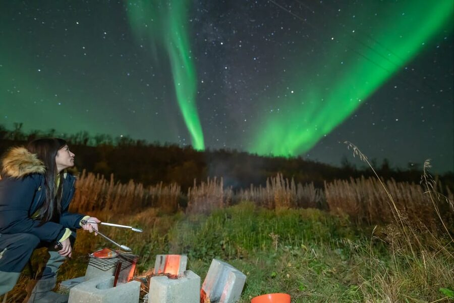Tromsø: Northern Lights Tour w/Photo, Suits and Local Guide - From the Radisson Blu to Base Camp